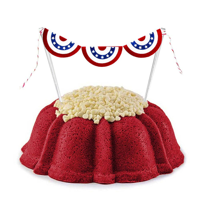 patriotic flag cake topper with a red velvet cake