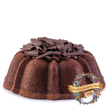 Load image into Gallery viewer, Chocolate pound cake in the shape of a bundt filled with chocolate sauce and topped with chocolate shavings. Serves 12. Featured in Oprah&#39;s Favorite Things 2016. Packaged in our signature yellow and white striped gift box with a blue bow.