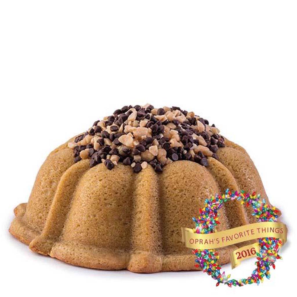 Coffee pound cake in the shape of a bundt filled with coffee toffee buttercream and topped with chocolate chips and toffee. Serves 12. Oprah's Favorite Things 2016. Packaged in our signature yellow and white striped gift box with a blue bow.