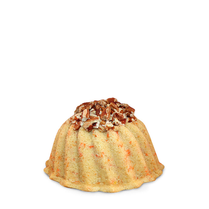 Carrot and cinnamon pound cake in the shape of a bundt filled with cinnamon cream cheese buttercream and topped with toasted pecans. serves 6. Packaged in our signature yellow and white striped gift box with a blue bow.