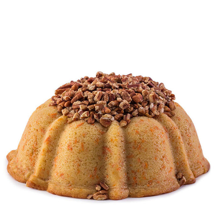 Carrot and cinnamon pound cake in the shape of a bundt filled with cinnamon cream cheese buttercream and topped with toasted pecans. serves 12. Oprah's Favorite Things. Packaged in our signature yellow and white striped gift box with a blue bow.