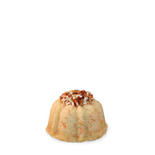 Load image into Gallery viewer, Carrot and cinnamon pound cake in the shape of a bundt filled with cinnamon cream cheese buttercream and topped with toasted pecans. serves 1-2. Each Janie&#39;s Cake Petite size pound cake is packaged in a clear container with a Janie&#39;s logo sticker and yellow and white striped closure sticker.