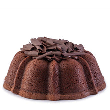 Load image into Gallery viewer, Chocolate pound cake in the shape of a bundt filled with chocolate sauce and topped with chocolate shavings. Serves 12. Featured in Oprah&#39;s Favorite Things. Packaged in our signature yellow and white striped gift box with a blue bow.