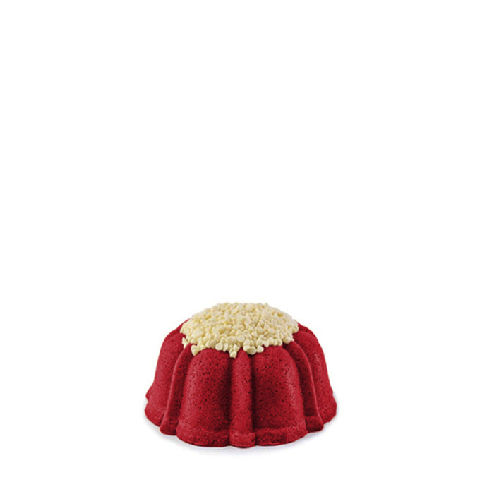 Red Velvet pound cake in the shape of a bundt the size of a cupcake filled with cream cheese buttercream and topped with white chocolate chips. Serves 1-2. 