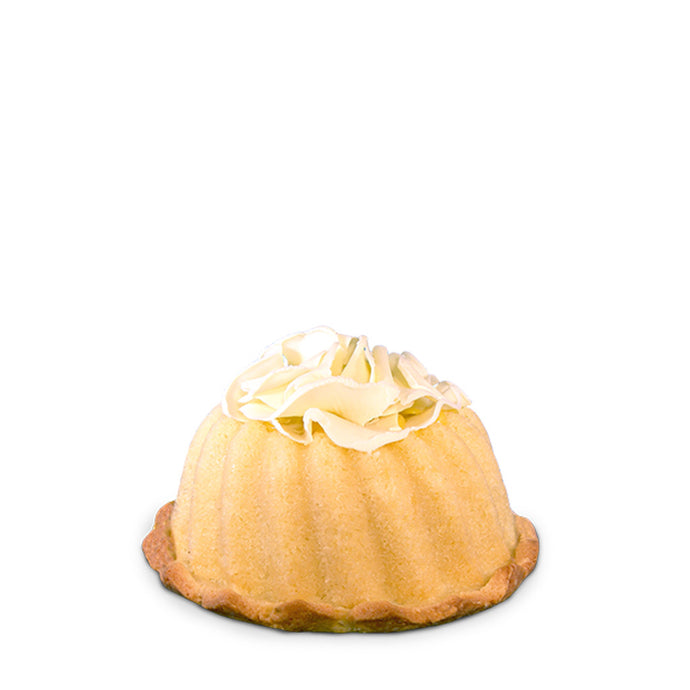 Vanilla pound cake in the shape of a bundt filled with lemon curd and topped with white chocolate shavings. Serves 12. Featured in Oprah's Favorite Things. Packaged in our signature yellow and white striped gift box with a blue bow. 