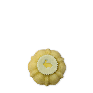 Pastel yellow Easter Bunny Medallion Petite Jane! Vanilla pound cake filled with vanilla buttercream topped with white chocolate Easter bunny medallions.