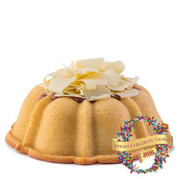 Berry Jane pound cake in the shape of a bundt filled with raspberry curd and topped with white chocolate shavings. Serves 12. Featured in Oprah's Favorite Things 2016. 