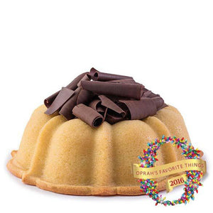 Vanilla pound cake in the shape of a bundt filled with chocolate sauce and topped with chocolate shavings. Serves 12. Featured in Oprah's Favorite Things 2016. Packaged in our signature yellow and white striped gift box with a blue bow.