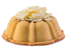 Load image into Gallery viewer, Vanilla pound cake in the shape of a bundt filled with raspberry curd and topped with white chocolate shavings. Serves 12. Featured in Oprah&#39;s Favorite Things. Packaged in our signature yellow and white striped gift box with a blue bow. 