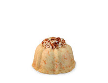Load image into Gallery viewer, Carrot and cinnamon pound cake in the shape of a bundt filled with cinnamon cream cheese buttercream and topped with toasted pecans. serves 1-2. Each Janie&#39;s Cake Petite size pound cake is packaged in a clear container with a Janie&#39;s logo sticker and yellow and white striped closure sticker.