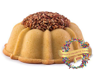 Vanilla pound cake in the shape of a bundt cake filled with Italian buttercream and topped with toasted pecans. Serves 12. Featured in Oprah's Favorite Things. Packaged in our signature yellow and white striped gift box with a blue bow.