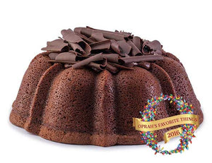 Chocolate pound cake in the shape of a bundt filled with chocolate sauce and topped with chocolate shavings. Serves 12. Featured in Oprah's Favorite Things. Packaged in our signature yellow and white striped gift box with a blue bow.