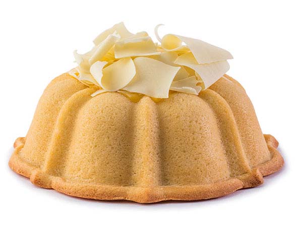 Vanilla pound cake in the shape of a bundt filled with lemon curd and topped with white chocolate shavings. Serves 12. Featured in Oprah's Favorite Things. Packaged in our signature yellow and white striped gift box with a blue bow. 