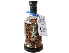 Load image into Gallery viewer, Delicious whiskey toasted pecans in a repurposed whiskey bottle. Janie&#39;s TX Bourbon whiskey toasted pecans are featured in our TX Bourbon Whiskey Lane Jane pound cake.